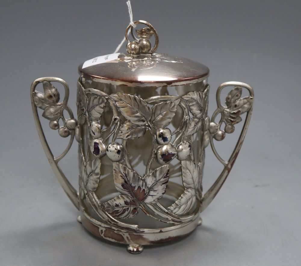 A WMF Art Nouveau embossed plated two handled mounted biscuit box, with a clear glass liner, underside stamped WMF, height 19cm